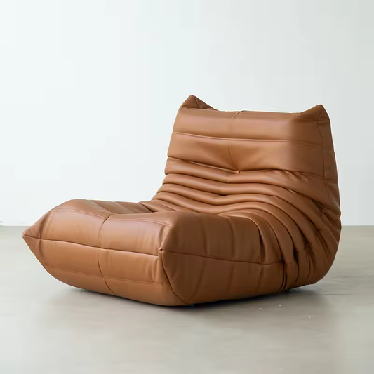 LOMÉ pleated armchair